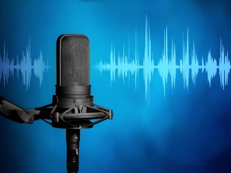 Broadcasting or podcasting microphone background with copy space